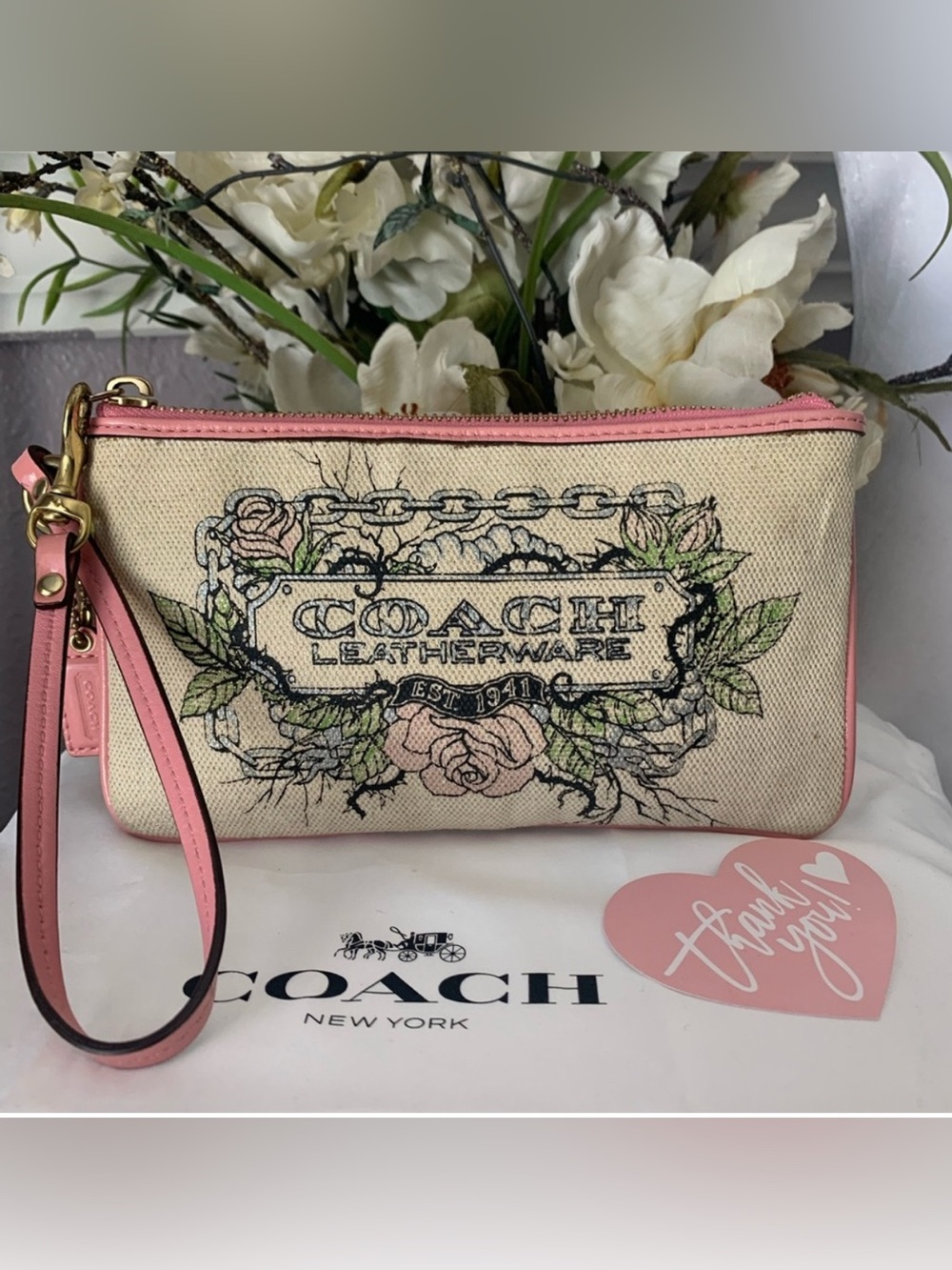 Limited Edition Coach Floral Canvas Wristlet Pink Leather Trim and Bow
Charm